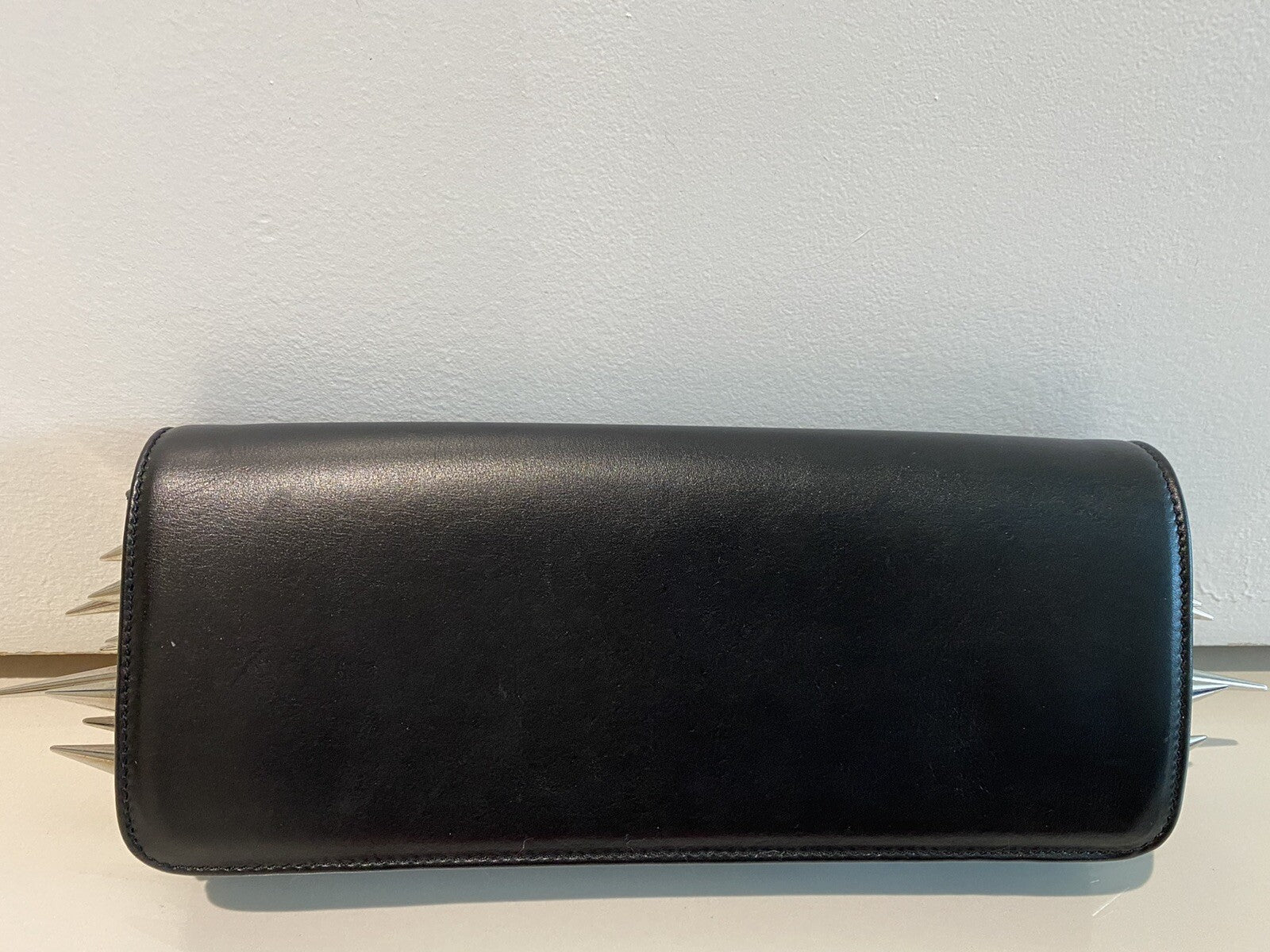 $2400 CHRISTIAN LOUBOUTIN BLACK LEATHER SPIKE CLUTCH