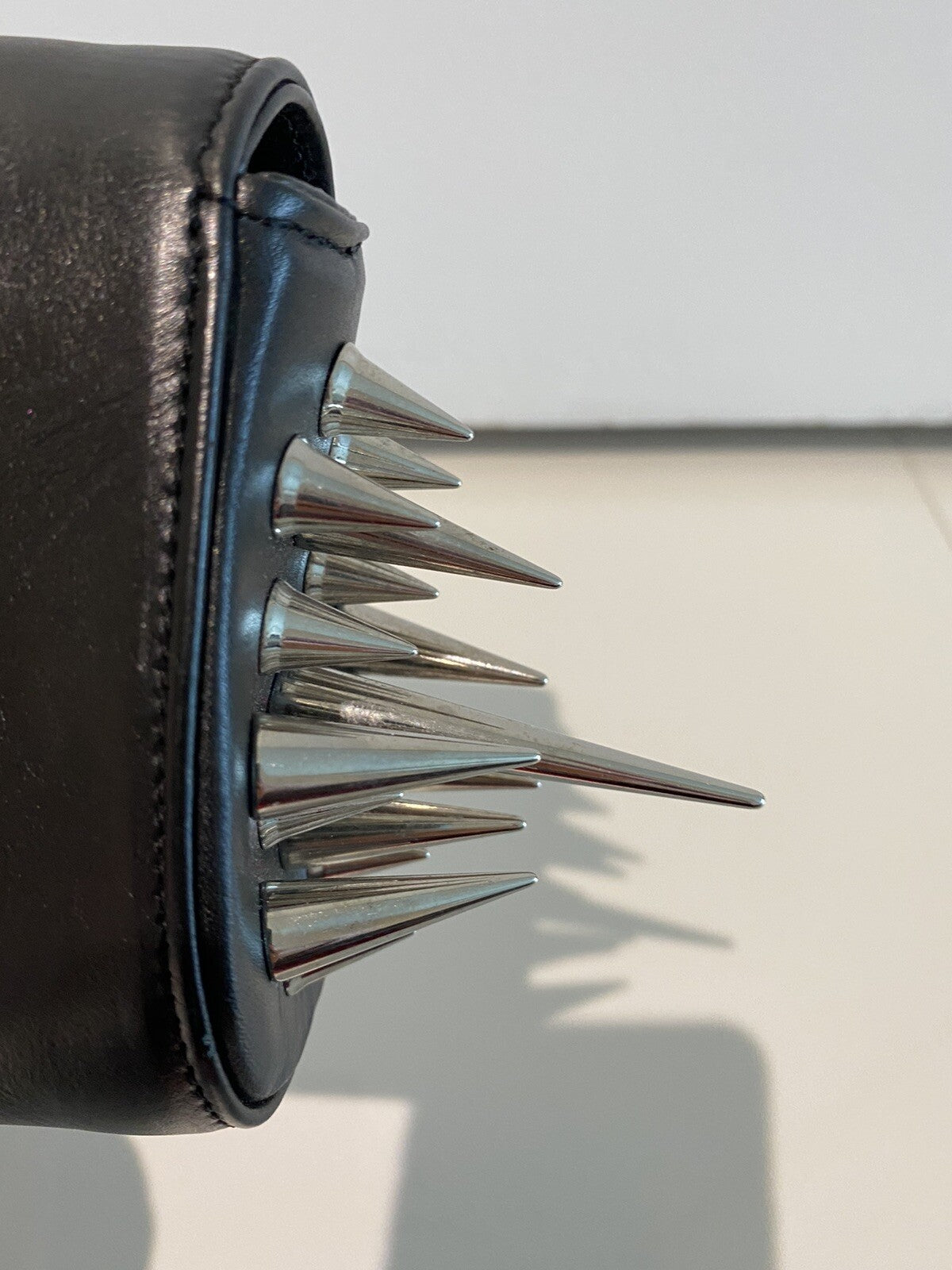 $2400 CHRISTIAN LOUBOUTIN BLACK LEATHER SPIKE CLUTCH