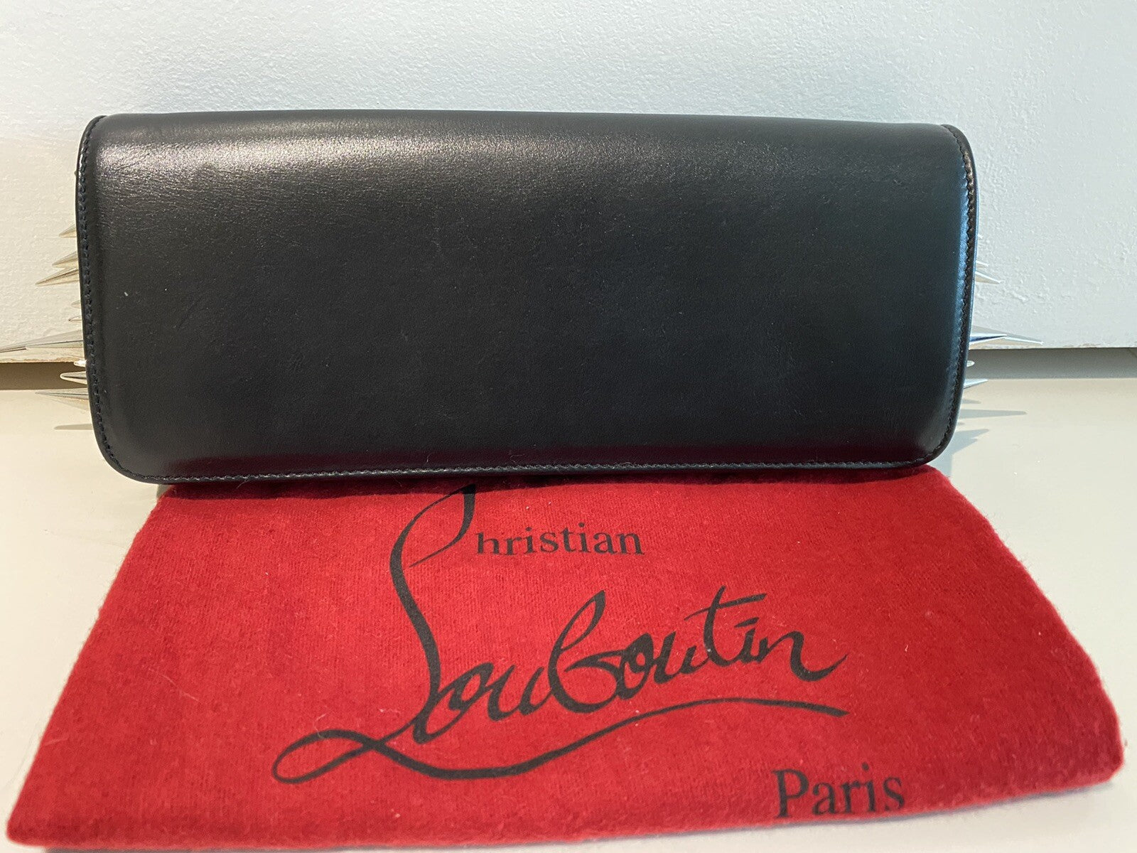 $2400 CHRISTIAN LOUBOUTIN BLACK LEATHER SPIKE CLUTCH